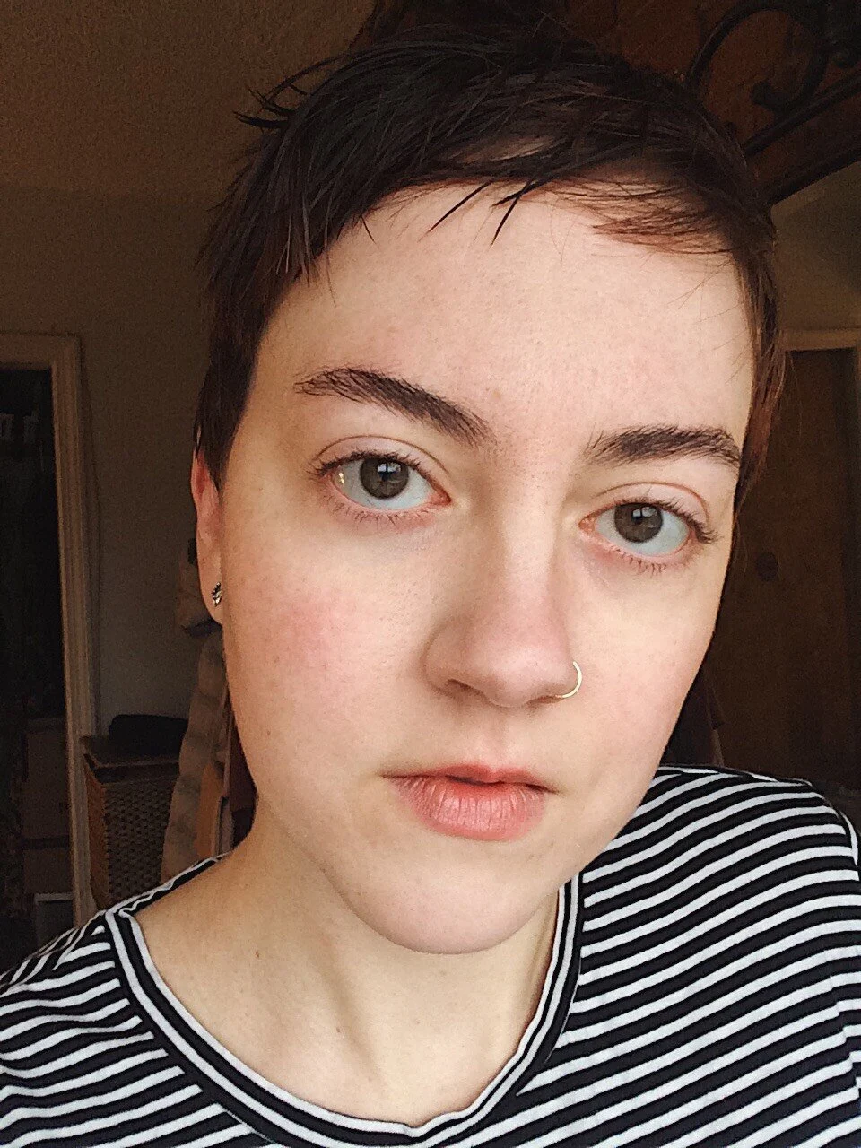  A typical daily makeup look, with Glossier Boy Brow and Haloscope, plus  The Body Shop Powder Foundation , Physician’s Formula Blush, and  Clinique Black Honey  Lip color 