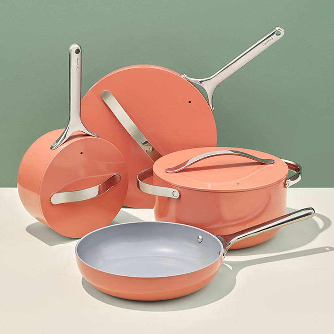 Caraway Home ceramic cookware set in peach color